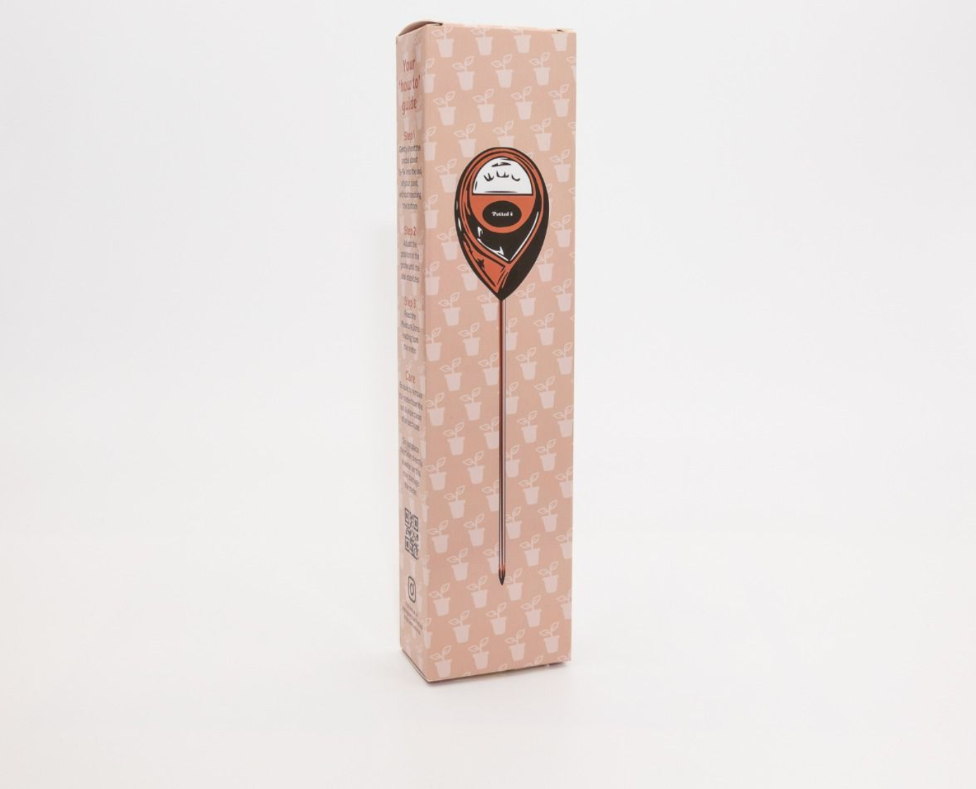 Long rectangular box with a decorative design on a white background