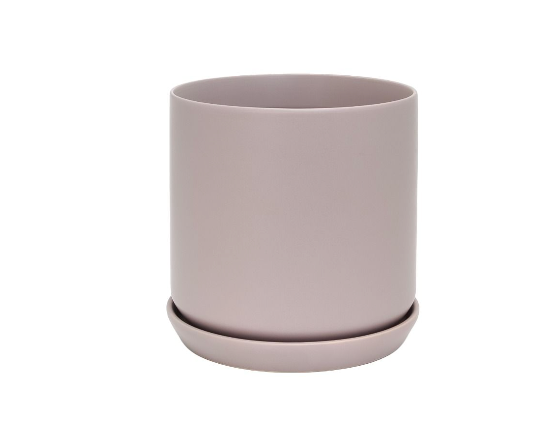 Mauve ceramic planter on a white background