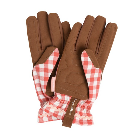 Brown gloves with red and white checkered lining on a white background