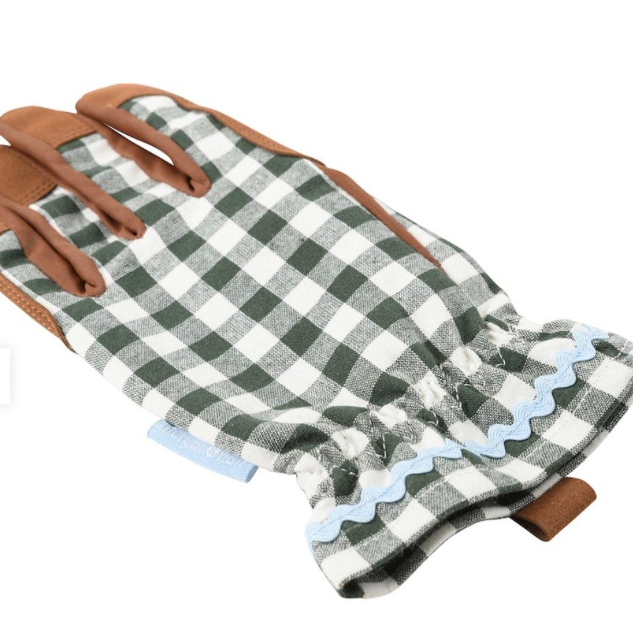 Gardening glove with green and white checkered palm and brown leather back on a white background