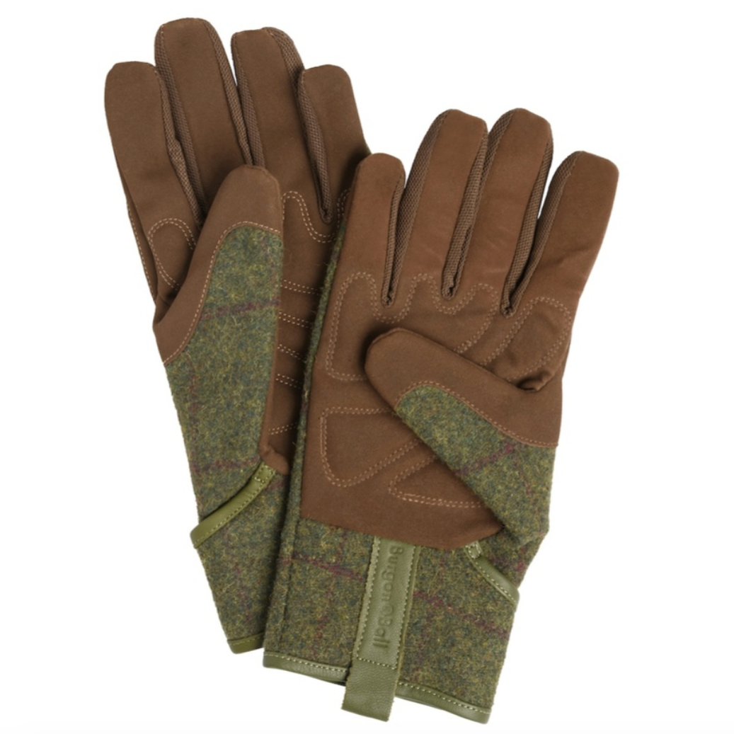 Pair of brown and green gloves on a white background