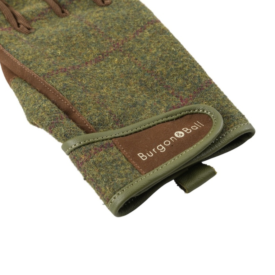 Green glove with brown accents and 'Burgon & Ball' branding on a white background