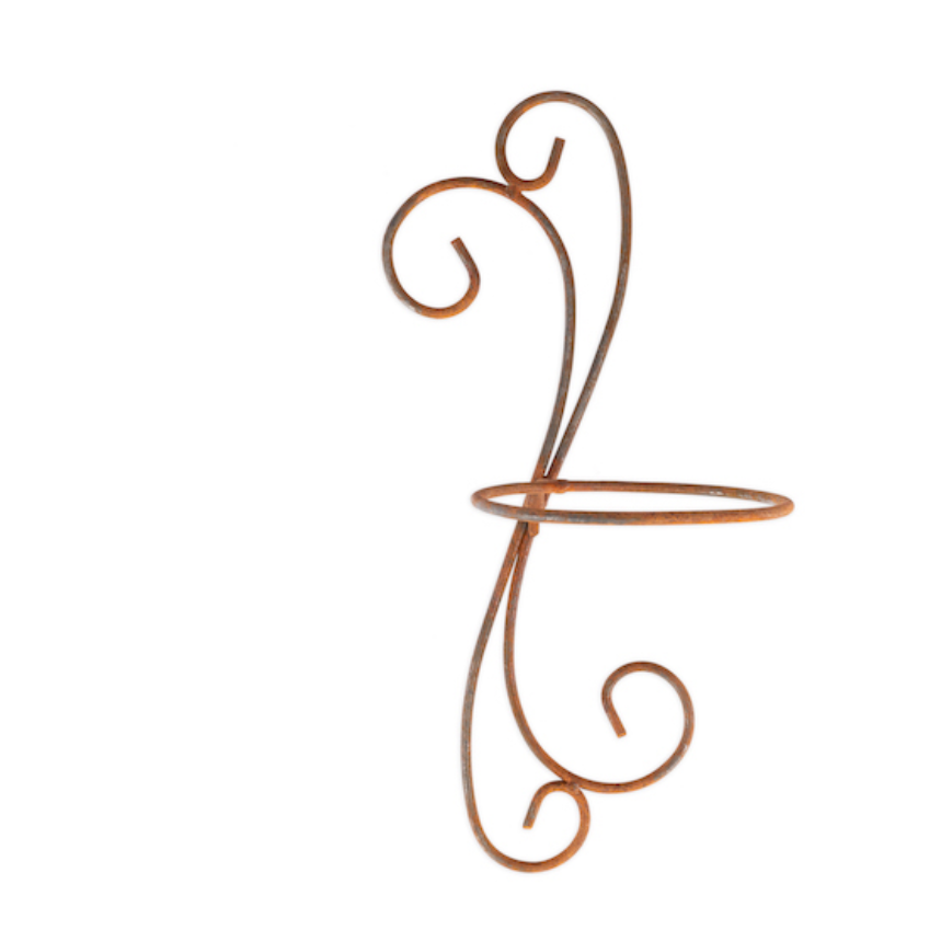 A decorative rusty metal wire wall hook with elegant scrollwork and a circular hanging loop, shown against a plain white background.