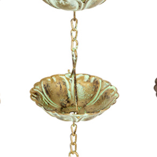 Three hanging metal rain collector bowls in distressed bronze, gold, and dark gray finishes, suspended by chains against a plain white background.
