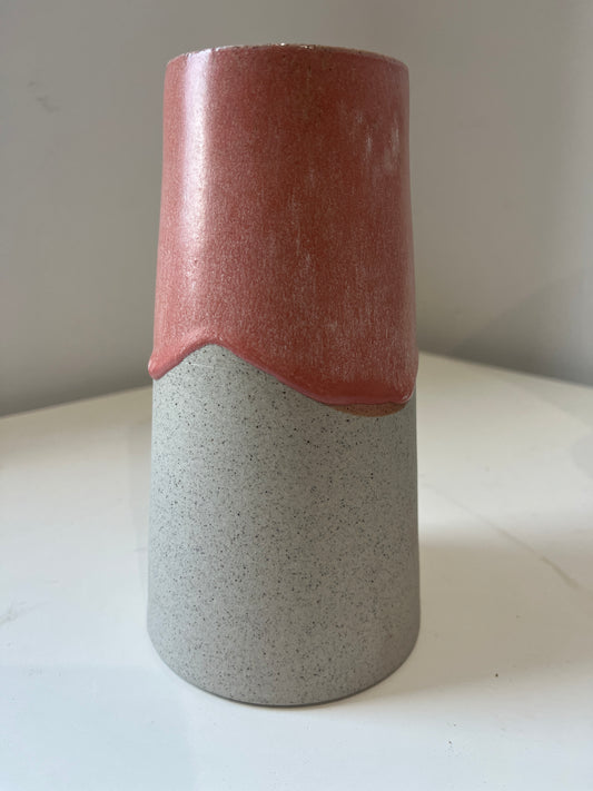 Cylindrical vase against a white background.
