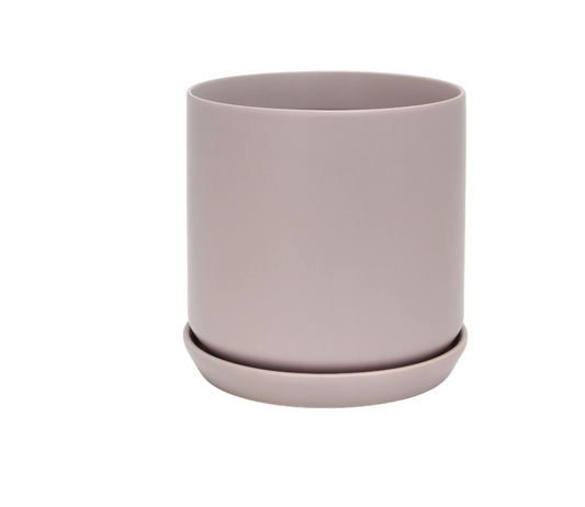 Mauve ceramic planter with saucer on a white background