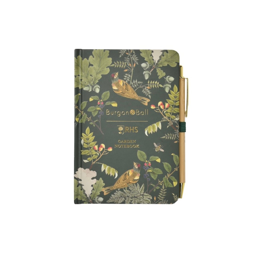 Notebook with nature-themed design and 'Burger & Ball' branding on a white background
